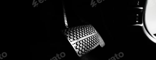 Preview: Close up foot press or push foot break and accelerate pedal of a car to drive ahead.