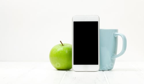 Preview: Workplace with smartphone, coffee and apple