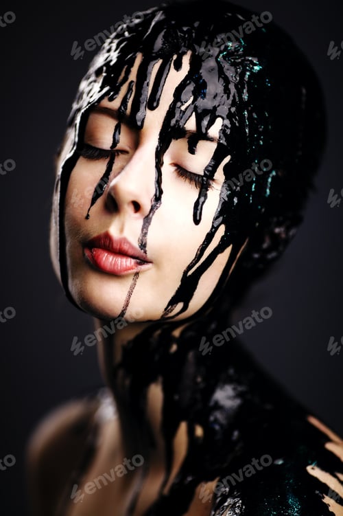 Preview: beautiful girl with flowing down the face paint