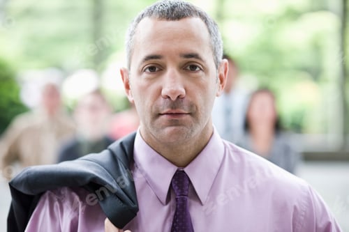 Preview: Portrait of a Caucasian businessman in the lobby of a convention center.