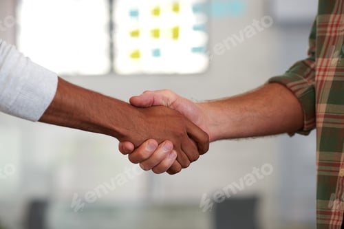Preview: Its great to finally meet you. Two casual men shaking hands.