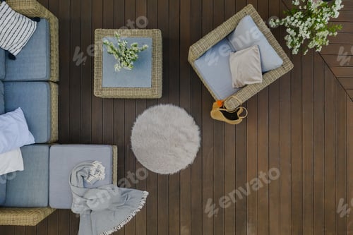 Preview: Top view of wooden terrace with comfortable wicker garden furniture