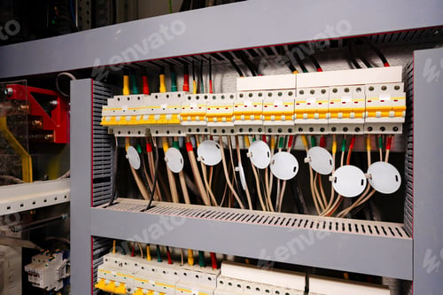 Preview: Detailed view of electrical panel with circuit breakers and wiring in a control room at a commercial