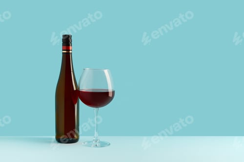 Preview: Bottle and glass of red wine on blue background. Mock up drink with place for you lable and text