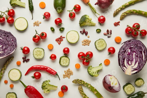 Preview: Top view of cutlery, vegetables and seeds on white surface