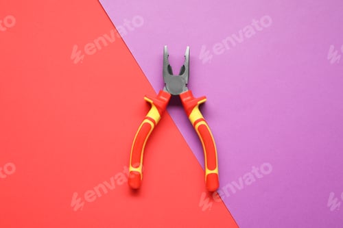 Preview: Combination pliers on color background, top view