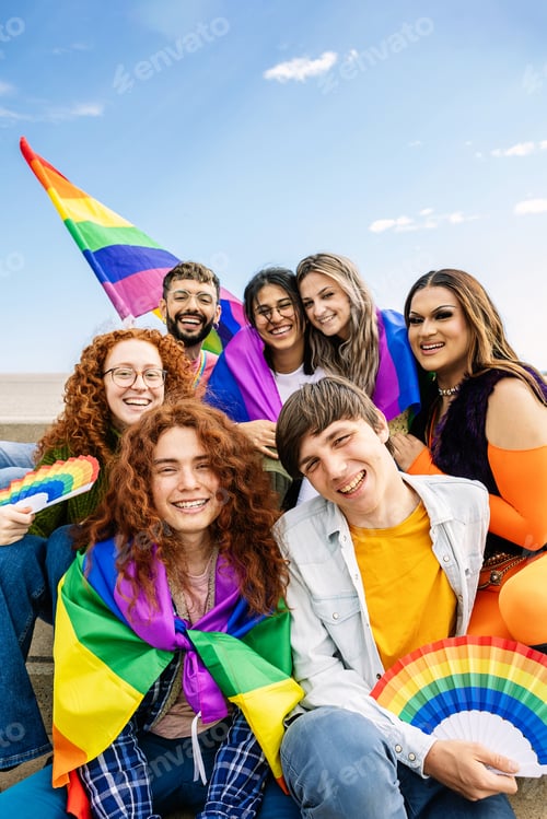 Preview: Portrait group of young gay people sitting together at LGBT pride parade day