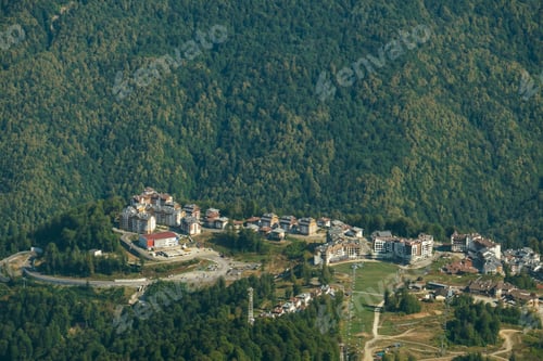 Preview: aerial view from the cable car to the Rosa Khutor resort in Sochi, Russia against Caucasus mountains