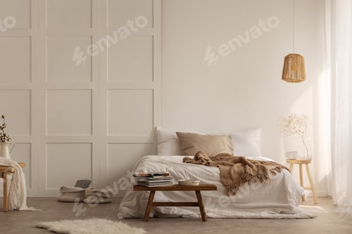 Preview: Natural blanket on white bed in simple bedroom interior with fur