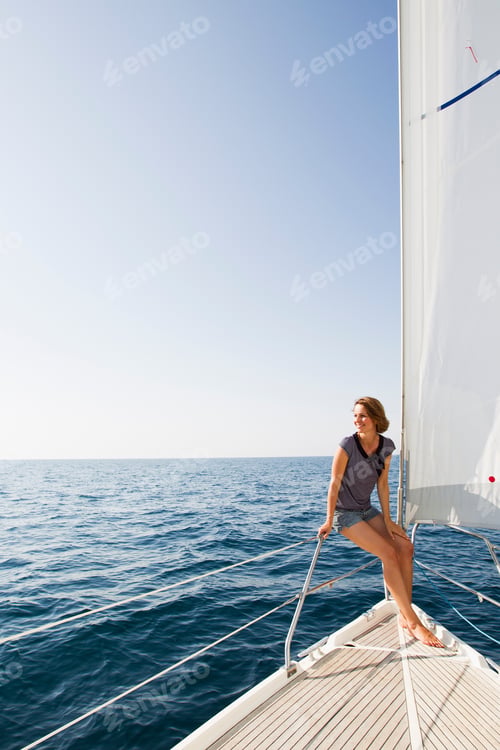 Preview: Smiling woman sitting on boat