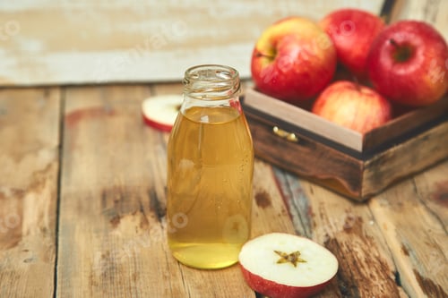 Preview: Apple cider vinegar. Bottle of apple organic vinegar
