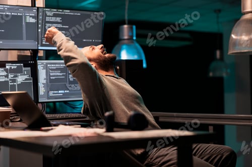 Preview: Pleased engineer celebrating ai software victory