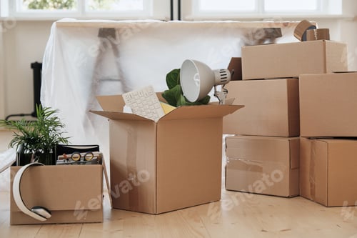 Preview: Abundance of moving boxes in office