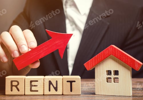 Preview: Wooden blocks with the word Rent, house and up arrow