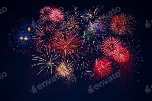 Preview: Beautiful celebration golden, red, blue sparkling fireworks over starry sky