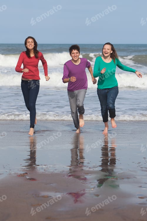 Preview: Three Friends Running on a Beach