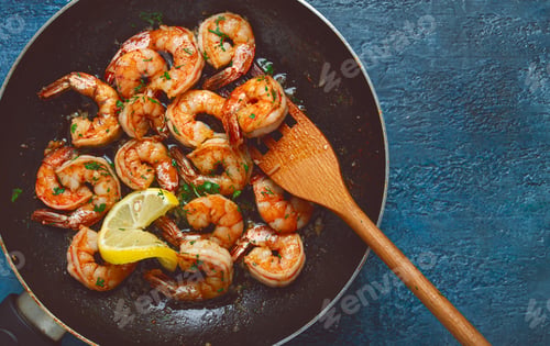 Preview: fried tiger prawns, jumbo, in garlic sauce, in butter, with herbs, in a frying pan, homemade,