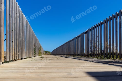 Preview: wooden bridge on the way to the beach