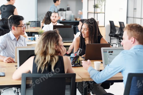 Preview: People working with computers at office