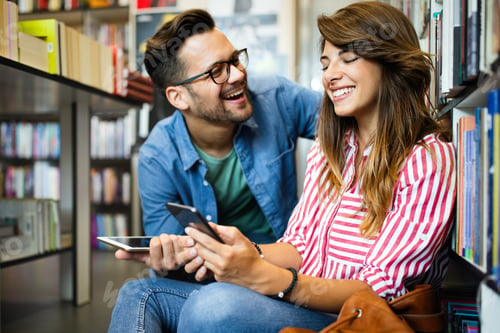 Preview: Group of college students studying in the school library