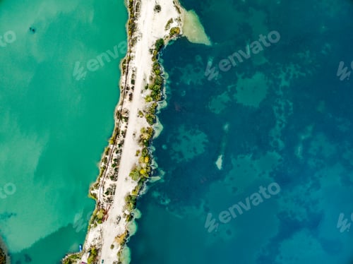 Preview: sandy shore with colourful water