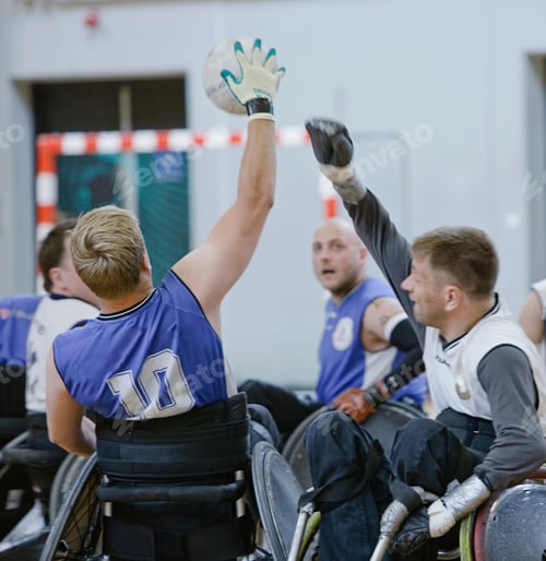 Preview: Men in wheelchairs playing pararugby