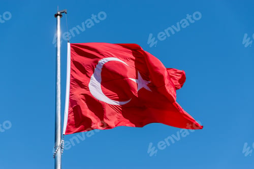 Preview: Big Turkish flag waving in the blue sky