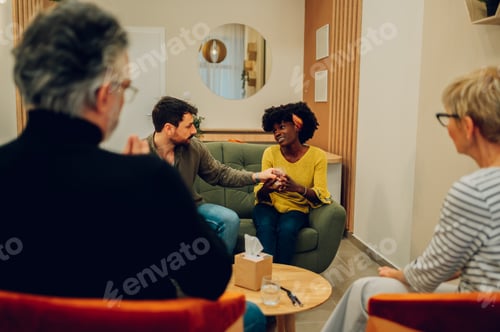 Preview: African american woman psychologist on a group therapy session discussing mental health
