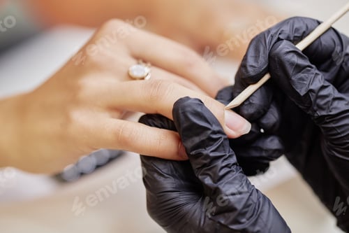 Preview: Manicure treatment in a beauty salon, close up
