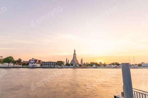 Preview: Wat Arun Temple during Sunset at Chao Praya River Bangkok, Thailand.