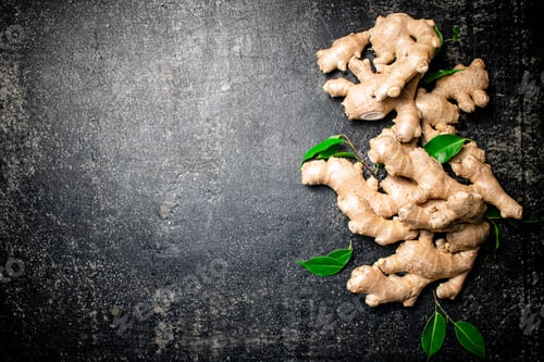 Preview: Fresh ginger root with leaves.
