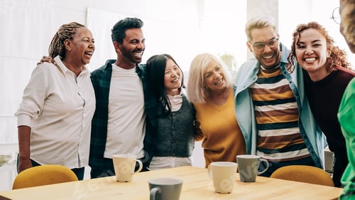 Preview: Multiracial people having fun inside home kitchen - Multi-generational friends concept