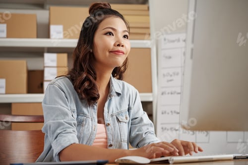 Preview: Woman working on computer