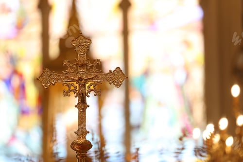 Preview: The cross standing on christian church and flare background