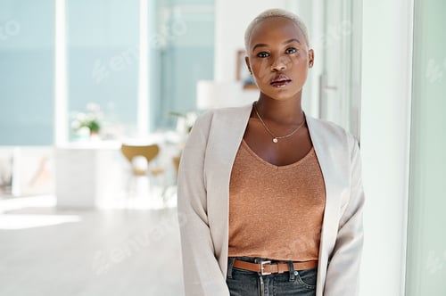 Preview: Portrait of an attractive young businesswoman standing inside her office