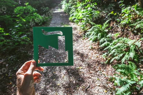 Preview: Hand holding eco friendly green living symbol