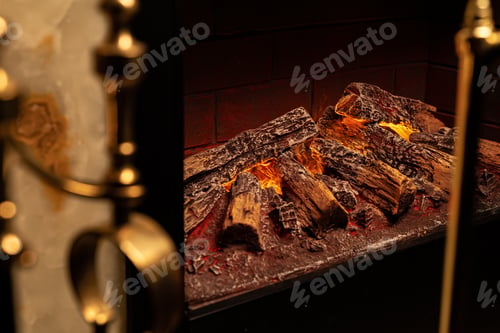 Preview: Close up of a fireplace with burning wood logs inside