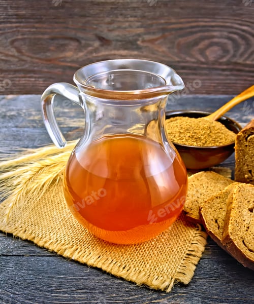 Preview: Kvass in glass jug on board