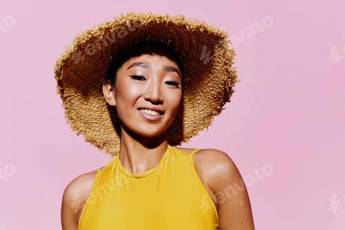 Preview: Young woman beauty yellow fashion swimsuit trendy closeup hand summer smile pink stylish portrait
