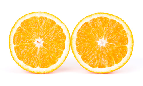 Preview: Cut Orange fruit isolated on white background