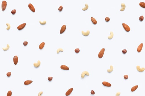 Preview: Hazelnuts, cashews, almonds pattern on white background
