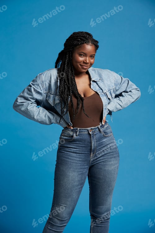 Preview: Happy ethnic plus size woman in casual outfit