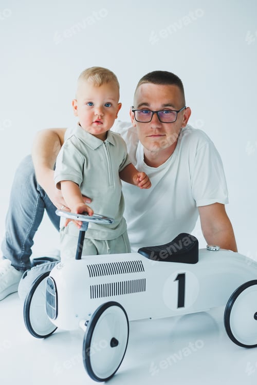 Preview: A Father and Child are enjoying a special bonding moment while playing together with a charming