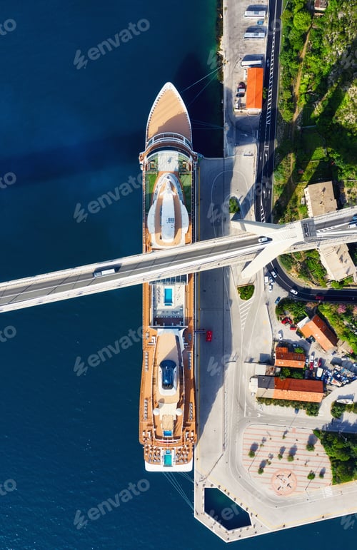 Preview: Road and traffic. Aerial view on the cruise ship and bridge in the port. Adventure and travel.