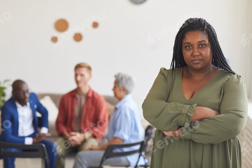 Preview: African-American Woman Posing Against Group Session