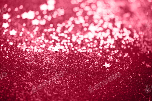Preview: Beautiful Christmas light background. Abstract glitter bokeh and scattered sparkles in gold, on