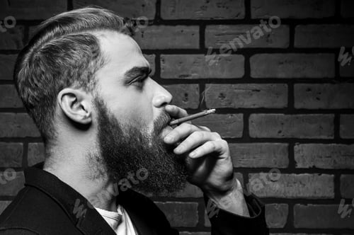 Preview: Man smoking.
