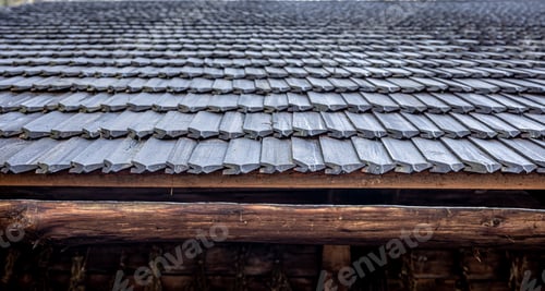 Preview: Close-up, the roof of a house made of wooden tiles.