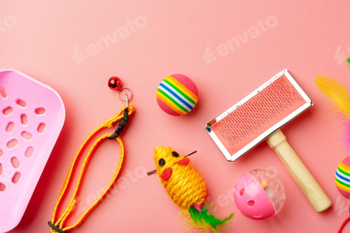 Preview: Pet toys on pink background studio shot