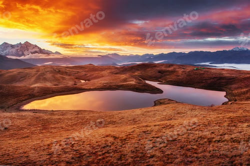 Preview: Sunset on mountain lake Koruldi. Upper Svaneti, Georgia, Europe.